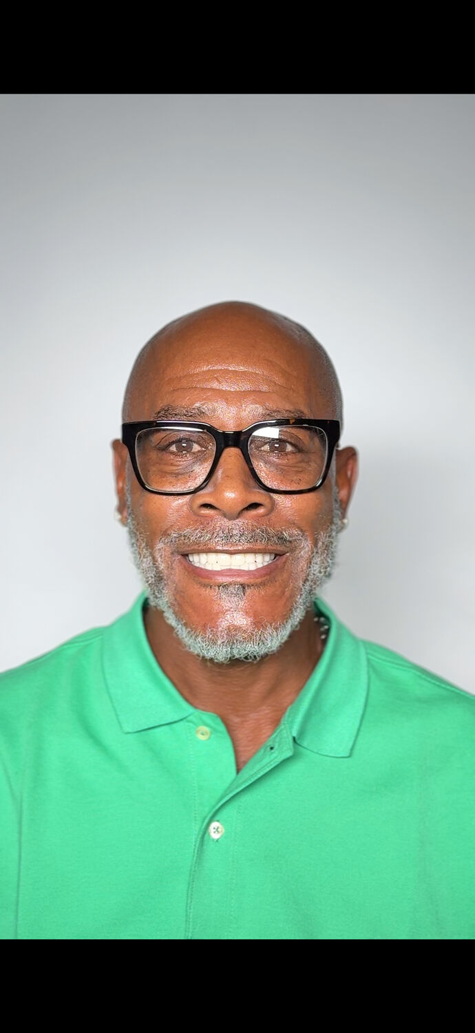 Patient 6 after dental restoration with natural-looking implants